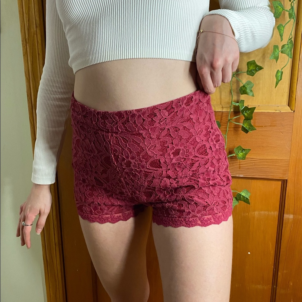 Red Lace Shorts from Streetwear Society Essentials with zipper detail on back